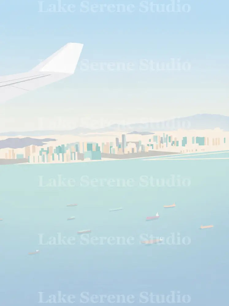 Airplane wing over a cityscape with a clear sky